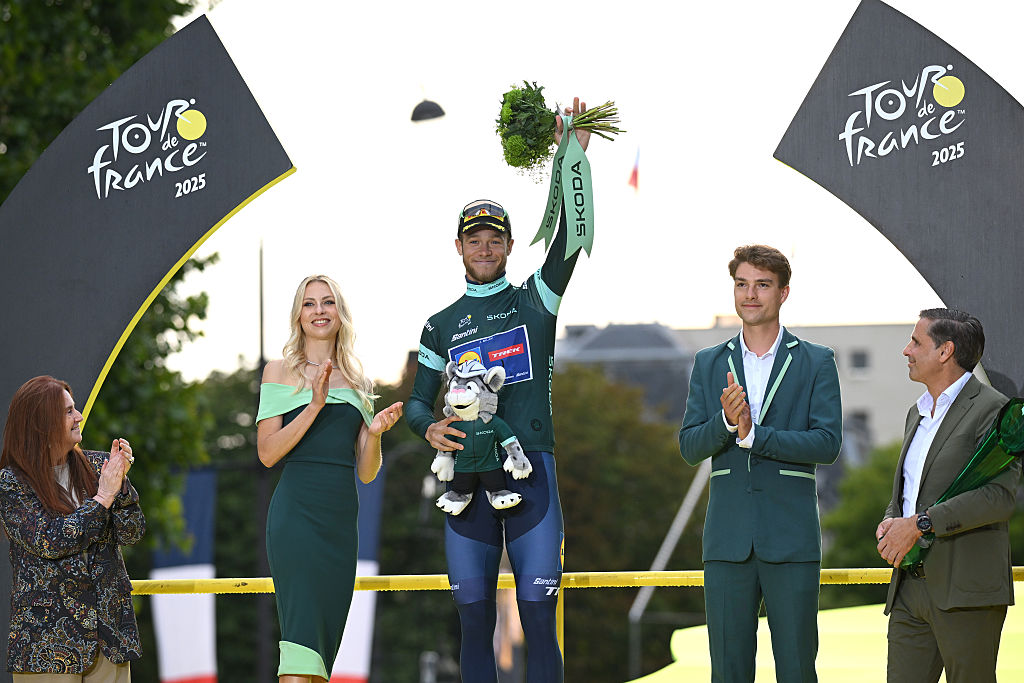 PARIS - CHAMPS-ELYSEES, FRANCE - JULY 27: Jonathan Milan of Italy and Team Lidl - Trek celebrates at podium as Green Sprint Jersey winner during the 112th Tour de France 2025, Stage 21 a 132.3km stage from Mantes-la-Ville to Paris - Champs-Elysees / #UCIWT / on July 27, 2025 in Paris - Champs-Elysees, France.