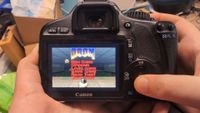 A still from a YouTube video showing Doom running on a DSLR camera