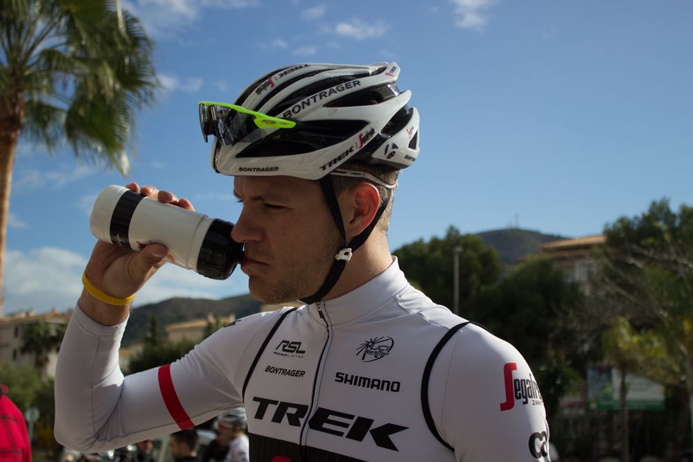Jasper Stuyven takes a post-ride drink