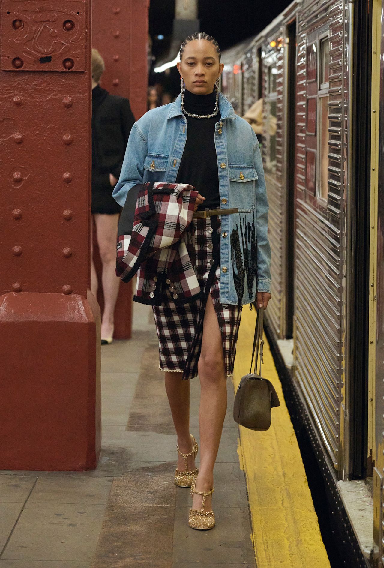 models walk the subway runway for the chanel metiers d'art 2026 show in new york city