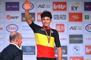 ZOTTEGEM BELGIUM JUNE 23 Gold medalist Arnaud De Lie of Belgium and Team Lotto Dstny celebrates winning during the medal ceremony after the 105th National Championships Belgium 2024 Mens Road Race a 2224km one day race from Sint Lievens Houtem to Zottegem on June 23 2024 in Zottegem Belgium Photo by Luc ClaessenGetty Images