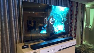 The LG G4 OLED TV being shown as part of a demo at CES 2024
