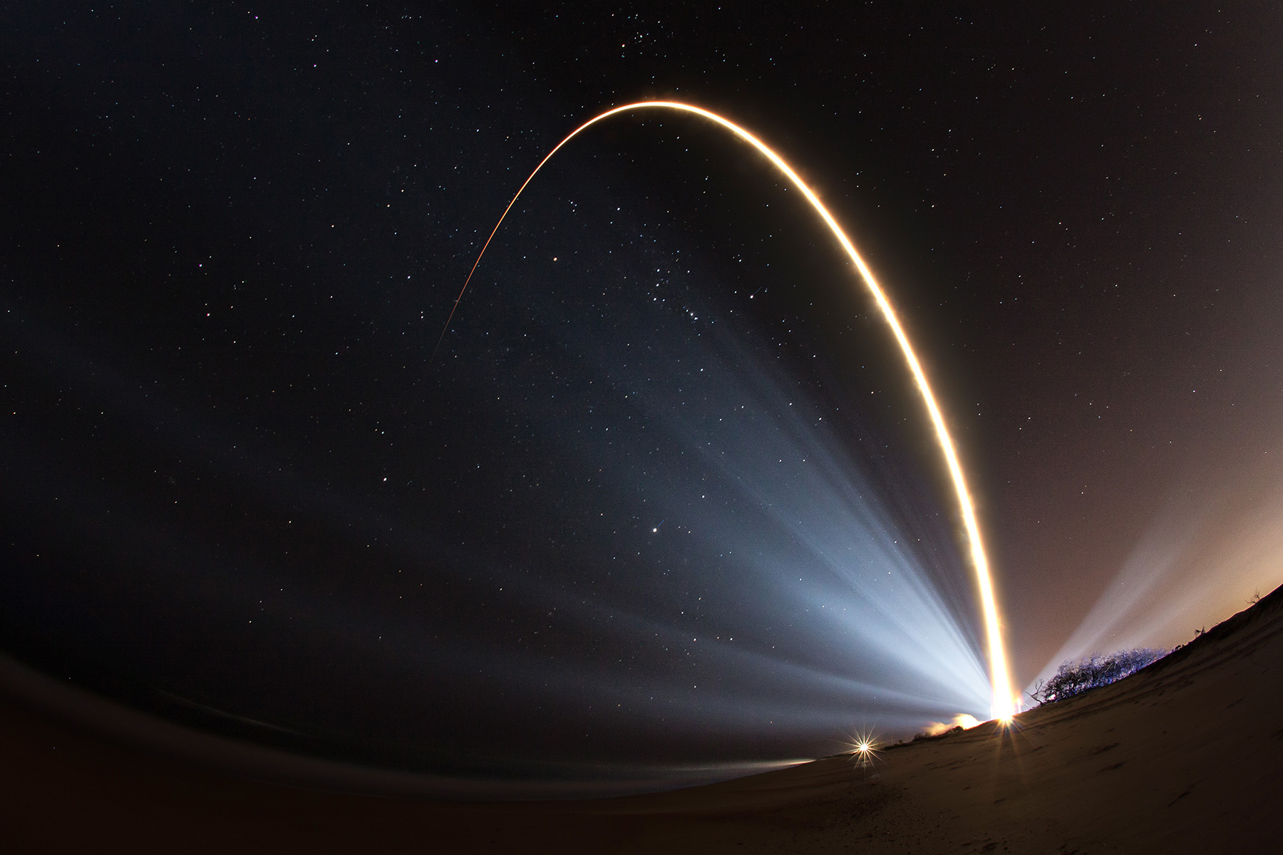 An Atlas V rocket carrying the U.S. Air Force&#039;s SBIRS Geo-3 missile warning satellite streaks into orbit from Cape Canaveral Air Force Station in Florida on Jan. 20, 2017 in this spectacular long-exposure view.