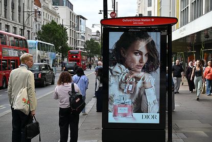 JCDecaux ad: A bus stop displays an advertisement for luxury fashion label Miss Dior perfume