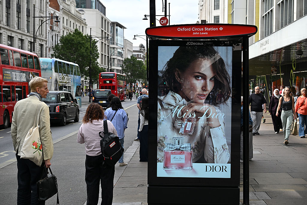 JCDecaux ad: A bus stop displays an advertisement for luxury fashion label Miss Dior perfume 