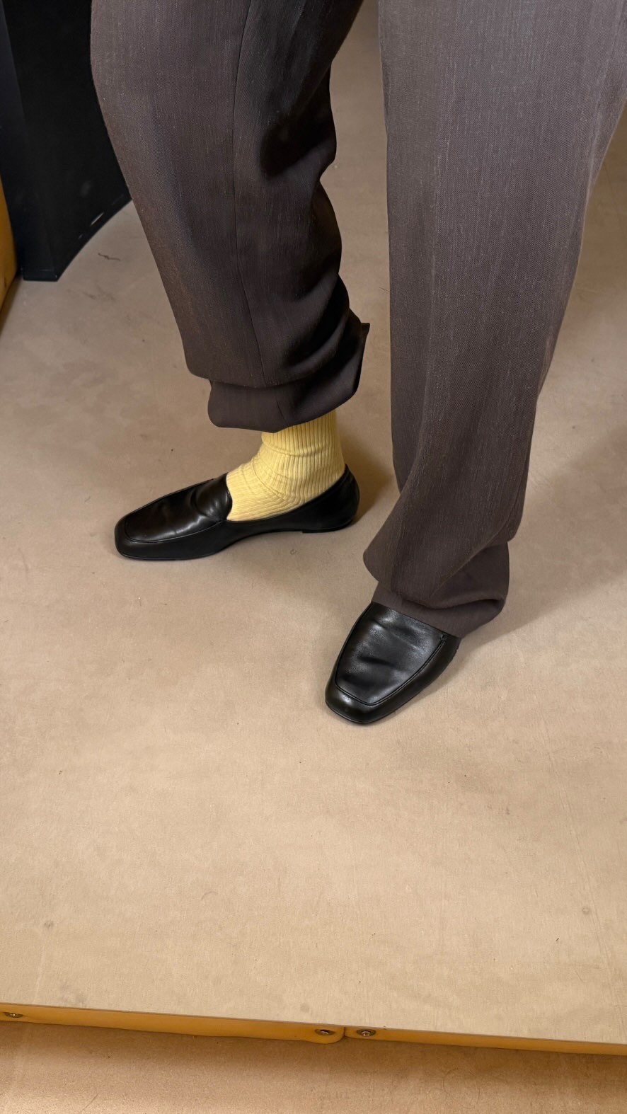 An image of @finnnthomas wearing the colourful socks trend.