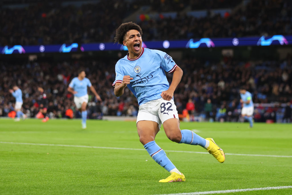 Rico Lewis of Manchester City celebrates scoring the 1st goal during the UEFA Champions League group G match between Manchester City and Sevilla FC at Etihad Stadium on November 2, 2022 in Manchester, United Kingdom.