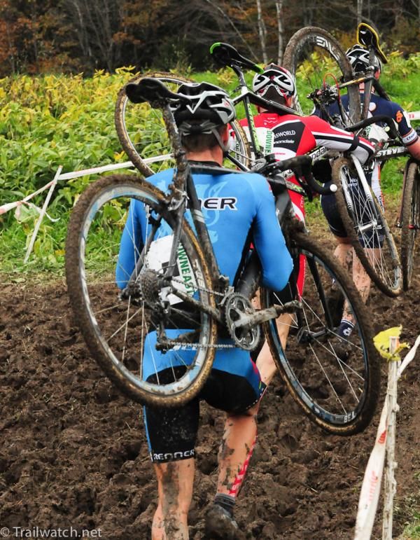 The leaders running in the mud