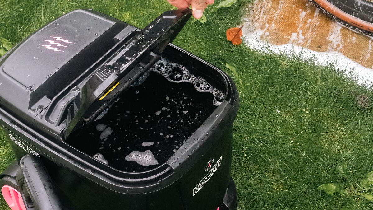 Close-up view of the Muc-Off Mobile Bike Pressure Washer filled with water.