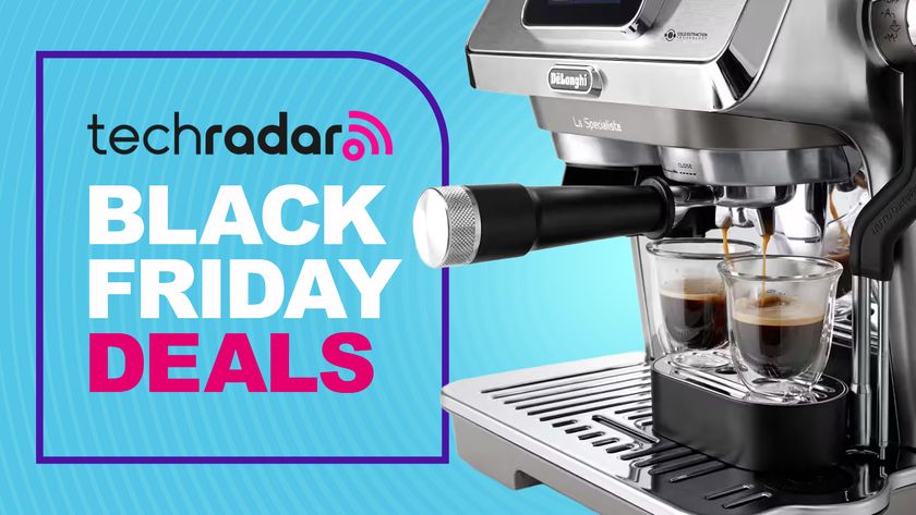 Close-up of De&#039;Longhi coffee maker pouring espresso with text &#039;TechRadar Black Friday deals&#039;