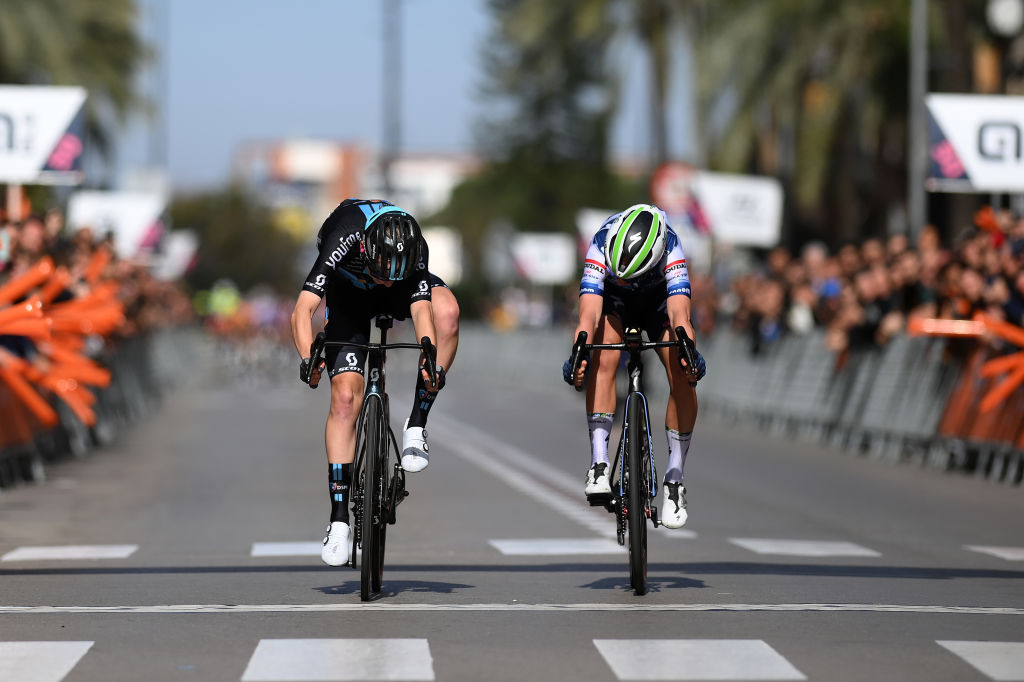 GANDIA SPAIN FEBRUARY 19 LR Elise Uijen of The Netherlands and Team DSM and Justine Ghekiere of Belgium and Team AG Insurance Soudal QuickStep sprint at finish line during the 7th Setmana Ciclista Volta Comunitat Valenciana Femines 2023 Stage 4 a 113km stage from Tavernes de la Valldigna to Gandia SetmanaCiclista23 on February 19 2023 in Tavernes de la Gandia Spain Photo by Alex BroadwayGetty Images