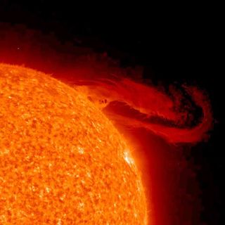 A stunning solar prominence erupting from the Sun and captured in extreme UV light.