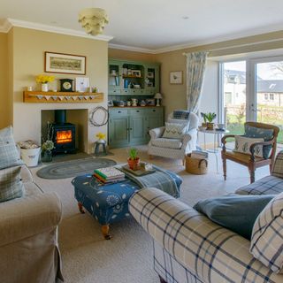 kincross-shire farm house living room with fireplace and yellow wall