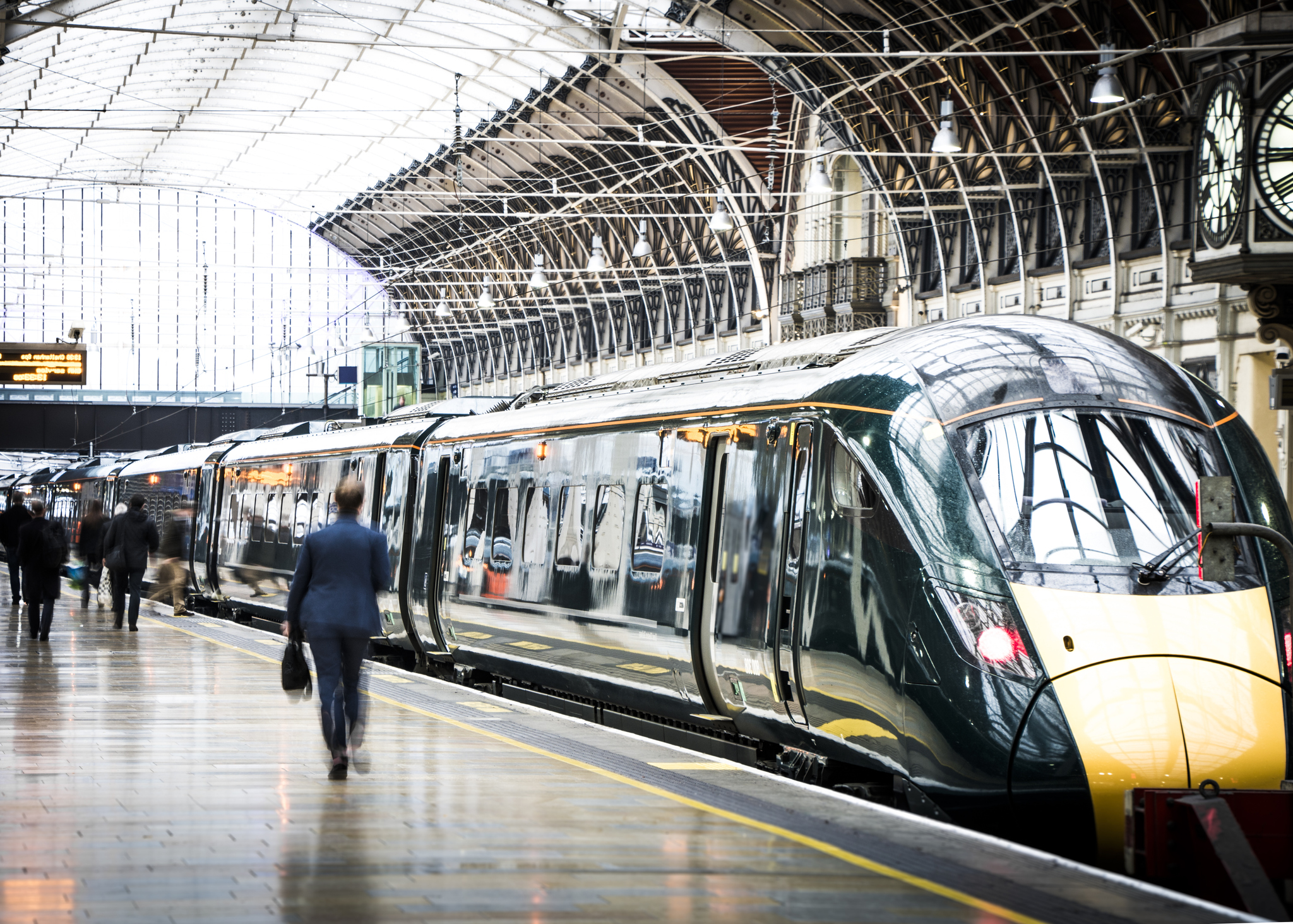 High Speed train with green livery waiting at a station