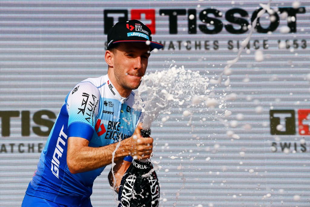 BUDAPEST HUNGARY MAY 07 Simon Yates of United Kingdom and Team BikeExchange Jayco celebrates winning the stage on the podium ceremony after the 105th Giro dItalia 2022 Stage 2 a 92km individual time trial stage from Budapest to Budapest ITT Giro WorldTour on May 07 2022 in Budapest Hungary Photo by Tim de WaeleGetty Images