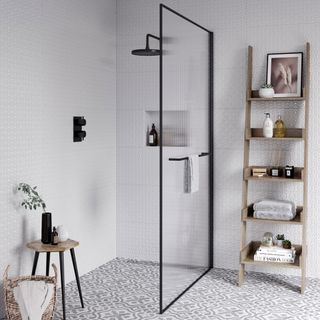 bathroom with white tiled walls and shower on wall