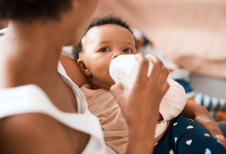 baby being bottle fed