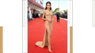 Zendaya wears a beige, sculpture like dress as she attends the red carpet of the movie "Dune" during the 78th Venice International Film Festival on September 03, 2021 in Venice, Italy.