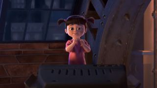 Boo behind a broken TV in Monsters, Inc.