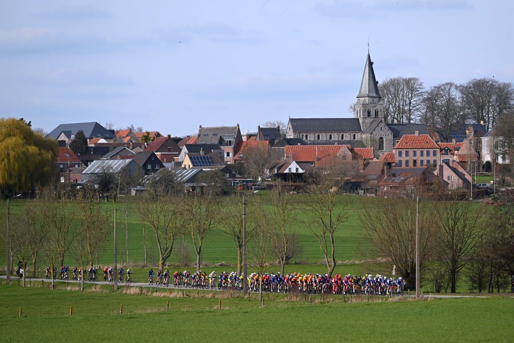 NOKERE BELGIUM MARCH 15 A general view of the peloton competing during the 77th Danilith Nokere Koerse 2023 Mens Elite a 1936km one day race from Deinze to Nokere DanilithNokereKoerse on March 15 2023 in Deinze Belgium Photo by Luc ClaessenGetty Images