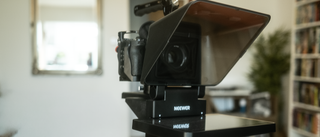 An X11 teleprompter on a tripod