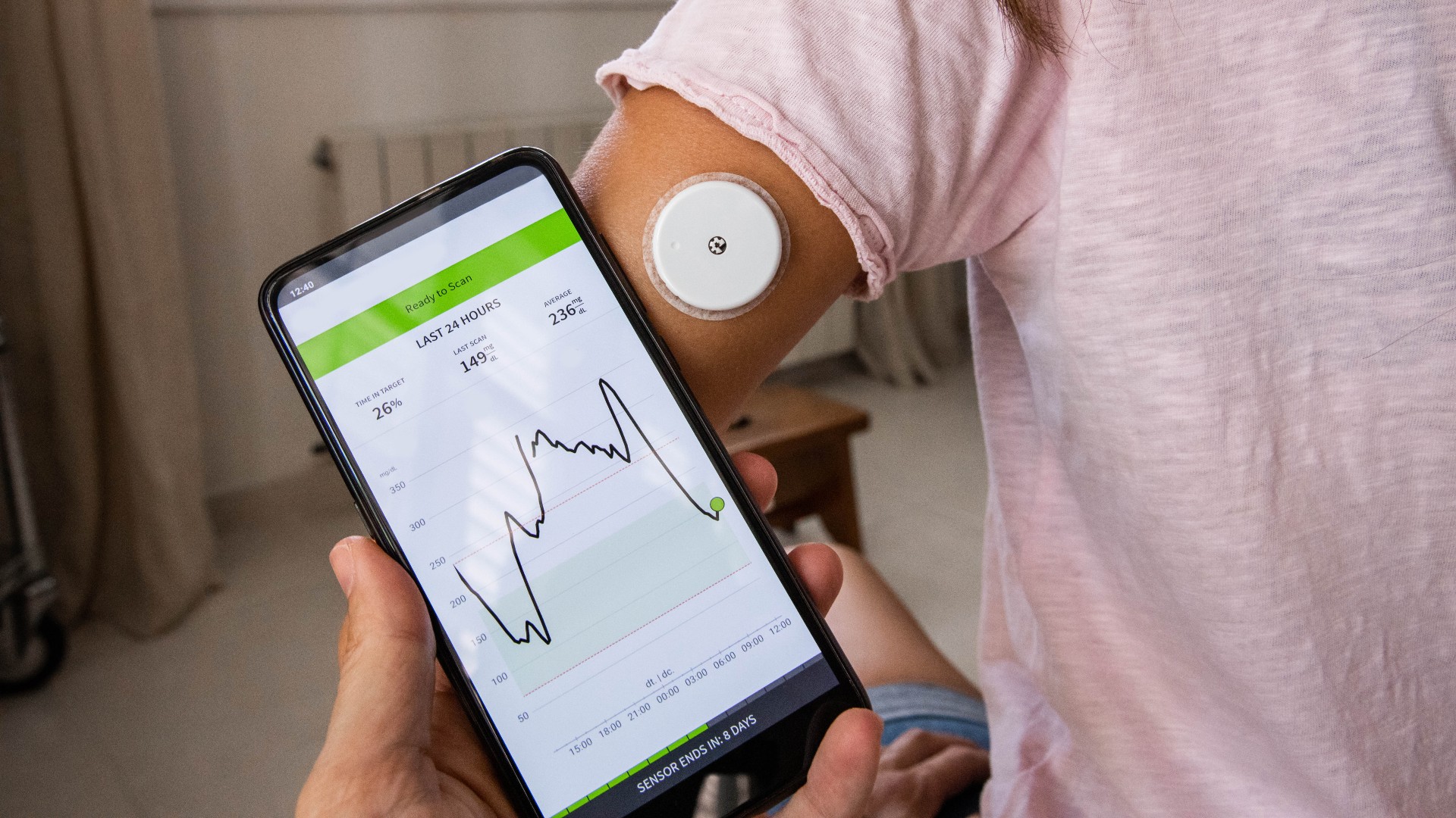 Continuous Glucose Monitoring (CGM) system. Monitoring the levels of glucose in blood using smart phone technology and electrode. Artur Debat via Getty Images
