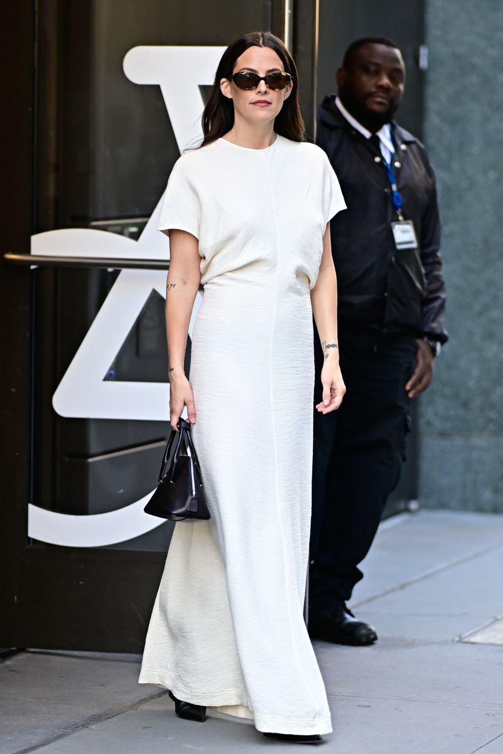 Riley Keough wearing Toteme White Maxi Dress