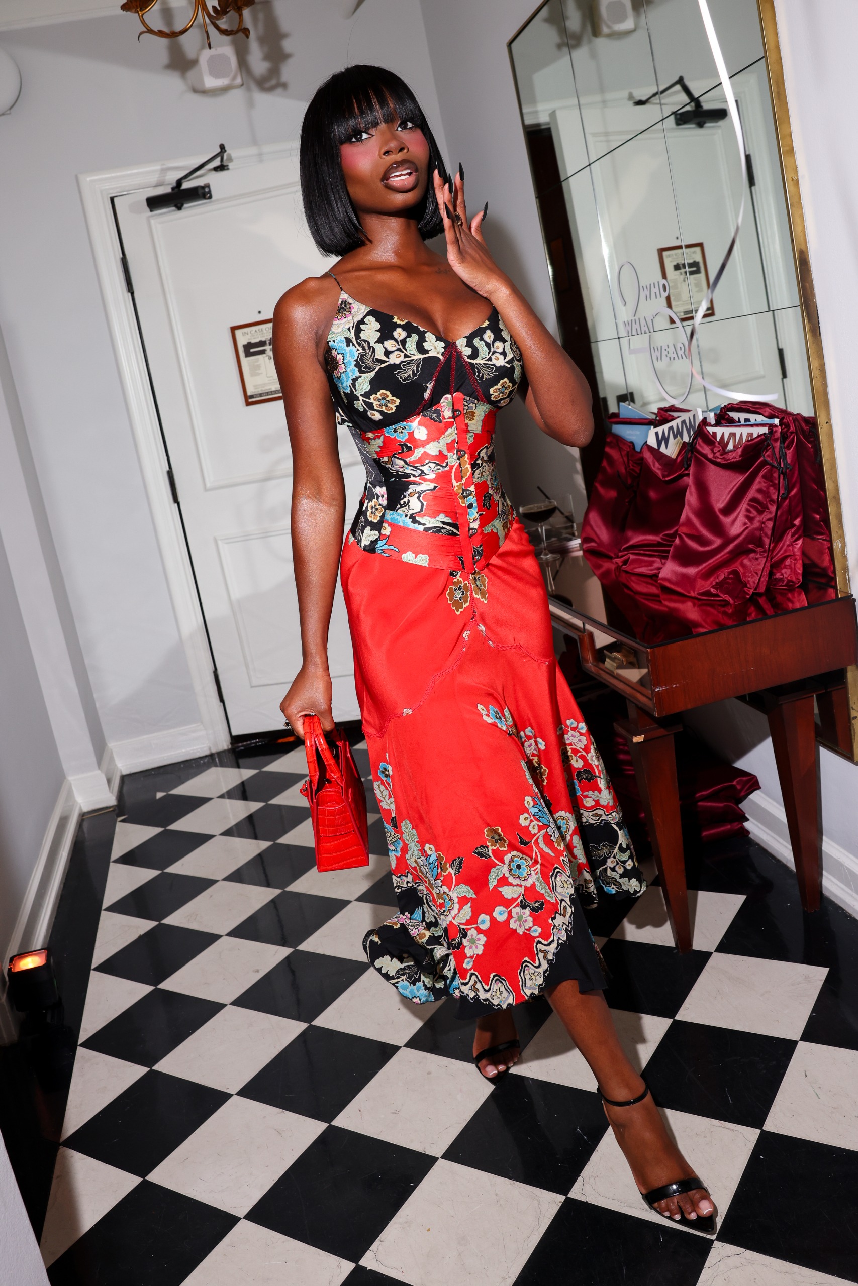 Olandria attending Who What Wear's 20th anniversary party.