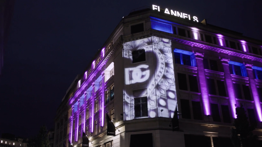 A Hippotizer server and Epson projector light up the side of a building with the D&amp;G logo projection mapped.