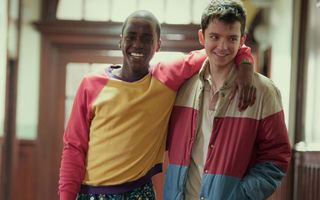 Ncuti Gatwa and Asa Butterfield share a smiling and relaxed moment in Sex Education