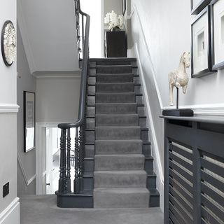Monochrome entrance hall and staircase