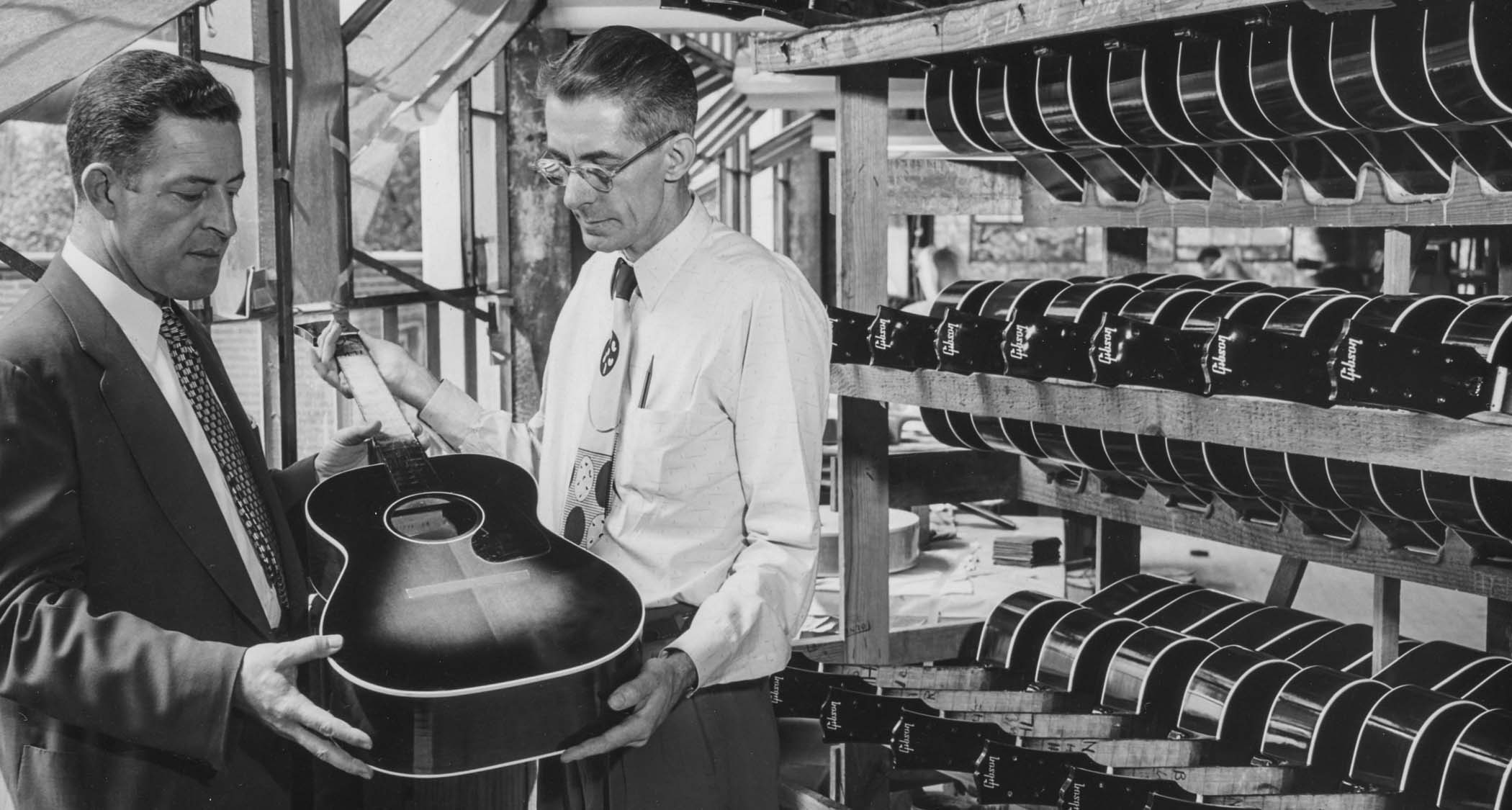 Gibson staff examine what looks to be a beautifully applied two-tone sunburst at Gibson in the dawn of the rock &amp;rsquo;n&amp;rsquo; roll era