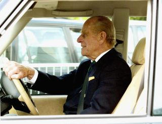 Prince Philip driving Land Rover