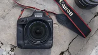 Top down shot of the Canon 1DX Mark III on a stone floor