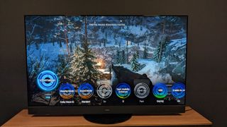 Panasonic MZ1500 with Battlefield V and game bar on screen