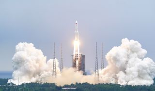 A Long March 5B rocket launches Tianhe, the core module of China's new space station, on April 28, 2021.The rocket's massive core stage fell back to Earth uncontrolled somewhere over the Arabian Peninsula on May 8, 2021.