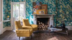 Blue living room with floral wallpaper and mid-century modern furniture