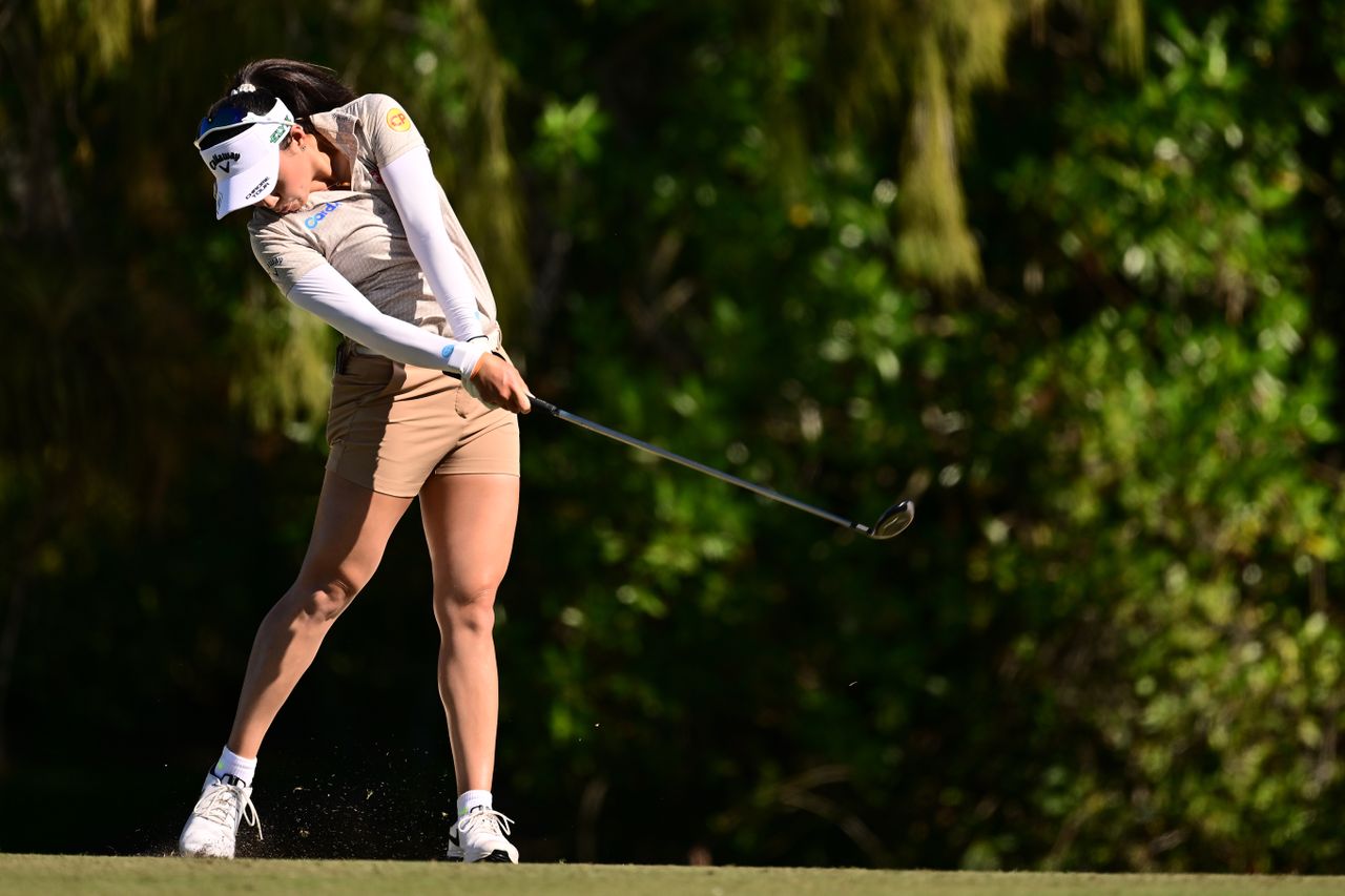 Jeeno Thitikul hits a wood off the fairway