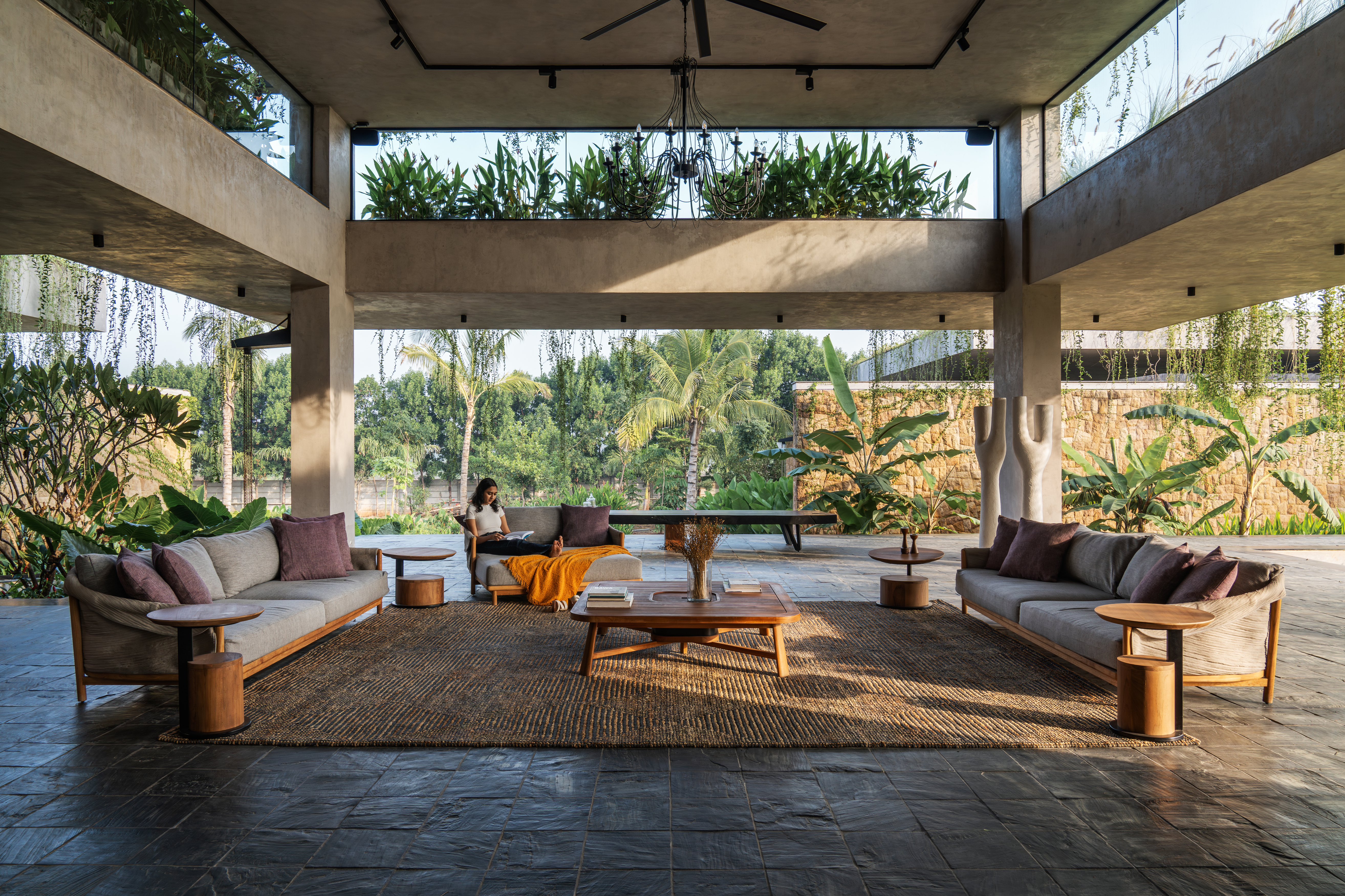 hyderabad home in brutalist style covered in greenery by 23 Degrees Design Shift