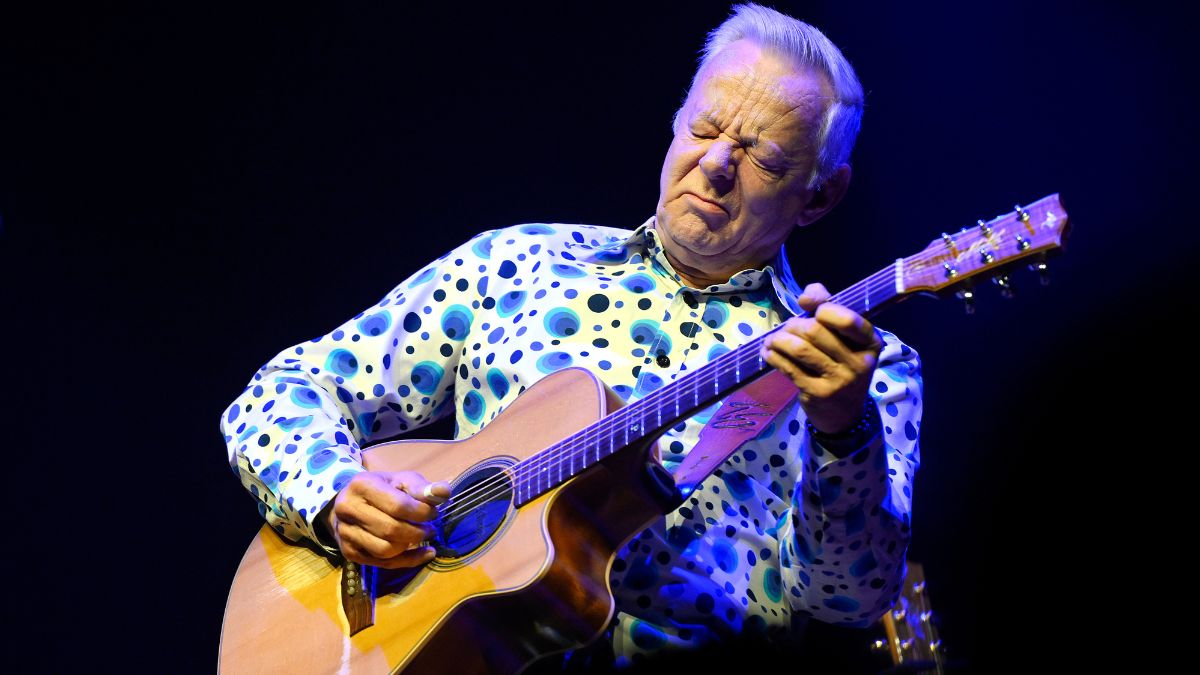 Tommy Emmanuel performs on stage at the Victorian Arts Centre, Hamer Hall on May 25, 2025 in Melbourne, Australia