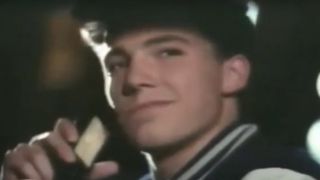 Ben Affleck smirking on a car phone in Burger King ad