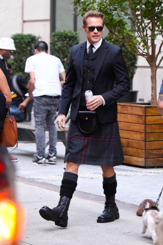Sam Heughan is seen walking in soho on October 05, 2023 in New York City.