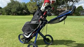 IZZO Ultra-Lite Cart Bag on a push cart on the golf course