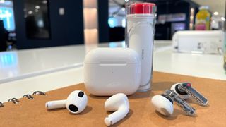 Nothing Ear (stick) alongside AirPods 3