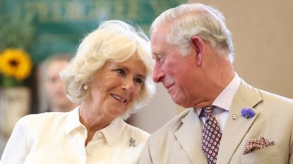 Prince Charles, Prince of Wales and Camilla, Duchess of Cornwall look at eachother as they reopen the newly-renovated Edwardian community hall The Strand Hall during day three of a visit to Wales on July 4, 2018 in Builth Wells, Wales.