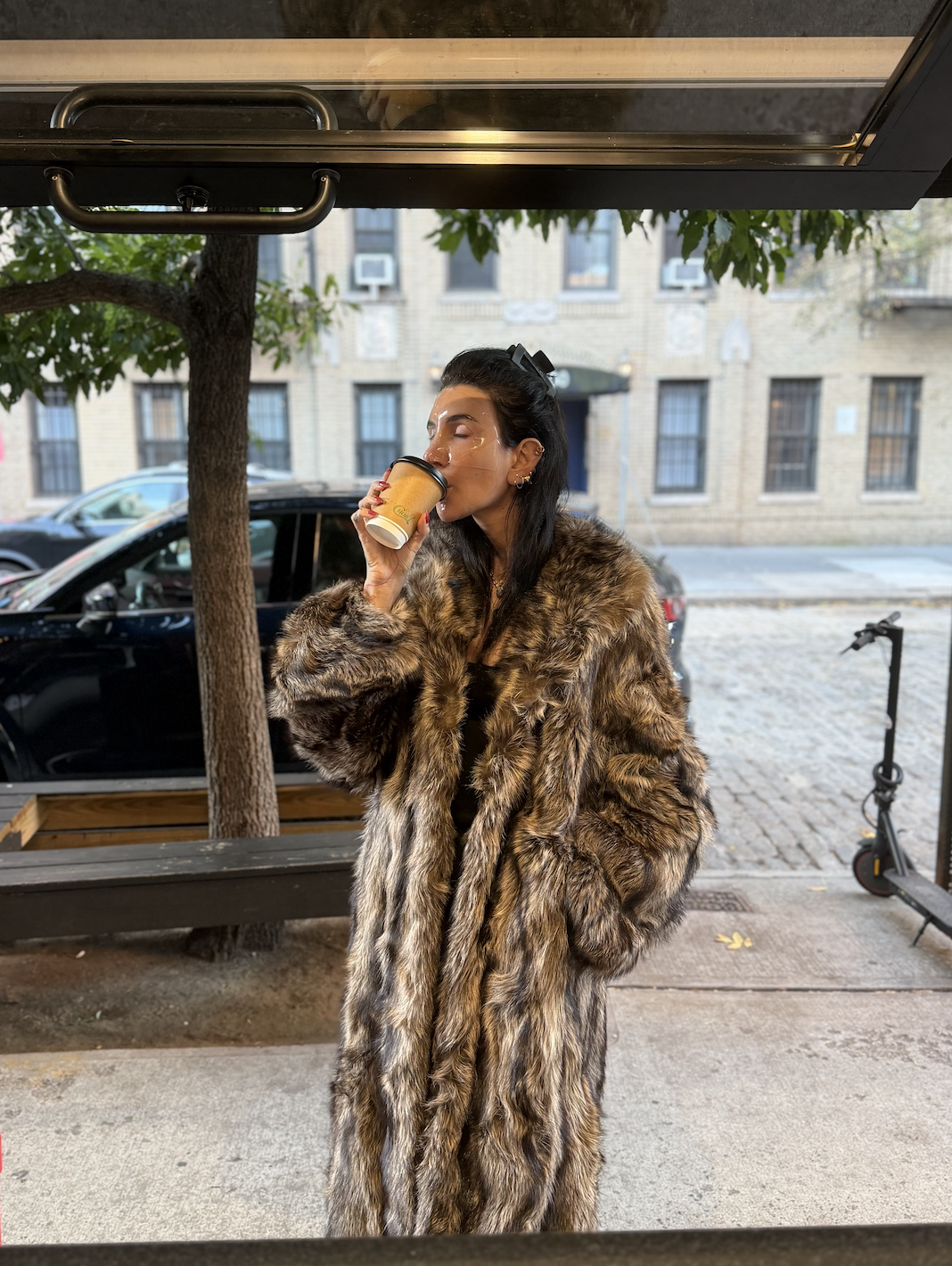 tanya akim drinking coffee in the yise hydrogel mask