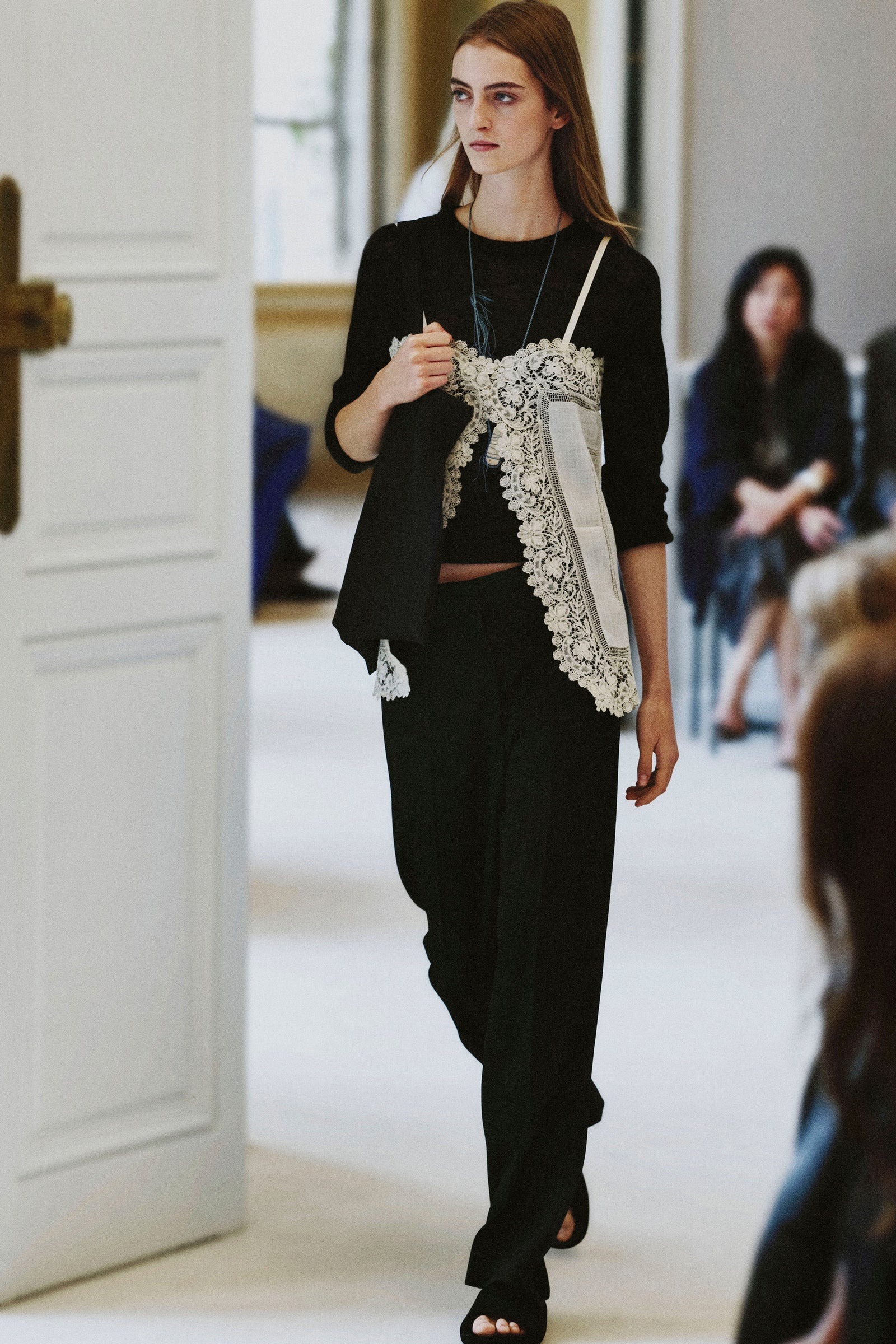 a model walks the The Row summer 2027 runway during Paris Fashion Week