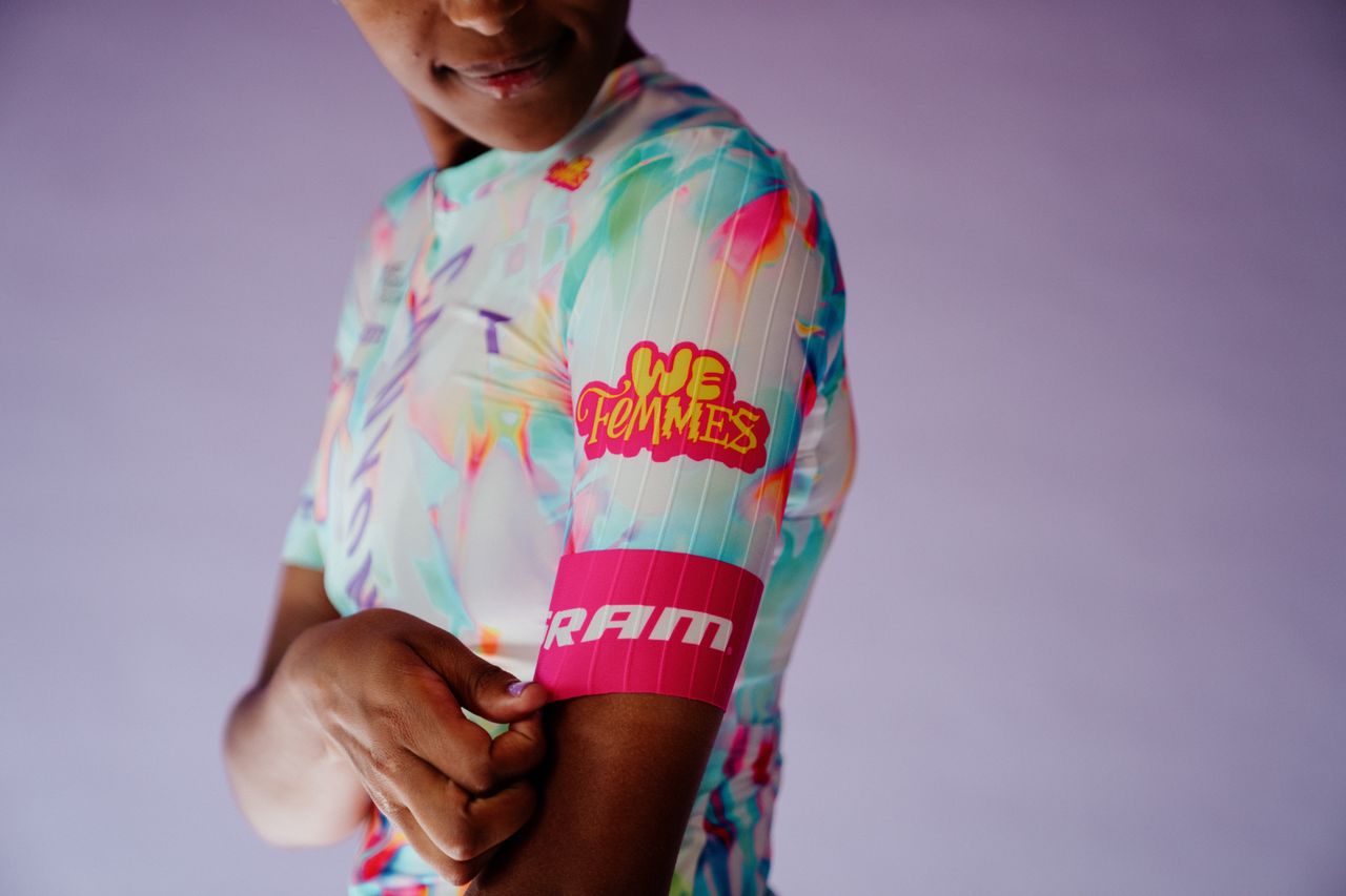 New Canyon-SRAM kit, featuring a light white background with colorful accents of pink, blue, orange and green, plus a pink and yellow 'We Femmes' logo