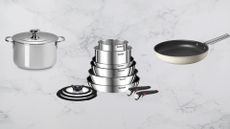 The Tefal Ingenio saucepan set, smeg frying pan, and Le Creuset stock pot on a woman&home marble background