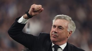 Carlo Ancelotti celebrates Real Madrid's Champions League win.